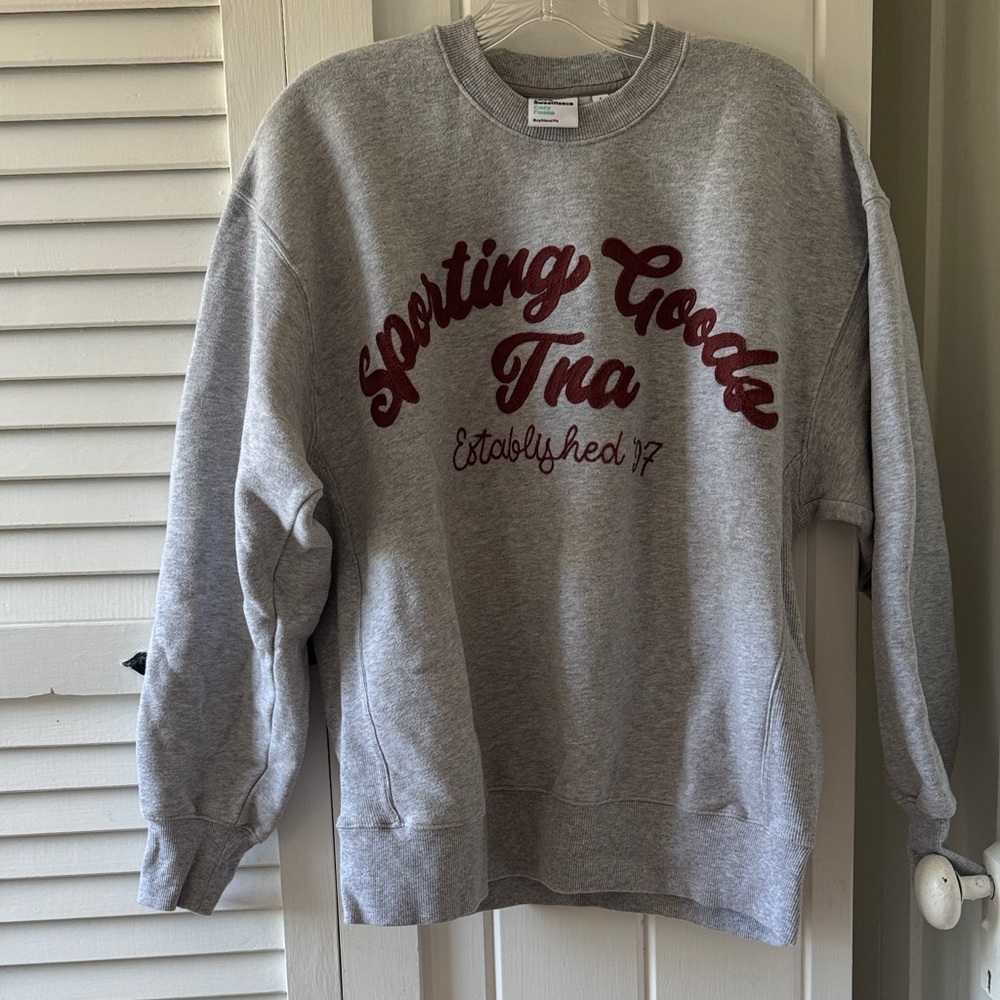 TNA Gray Crewneck Sweater with Red Lettering